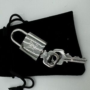 Louis Vuitton - super shiny brand new silver rare Lock and key #448